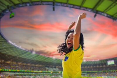 Fanka brazylijskiej drużyny na stadionie piłkarskim